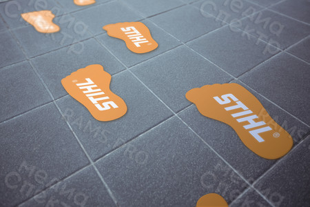 Наклейки фигурные на пол магазина 30х13см «СЛЕДЫ» с логотипом «STIHL» — фото